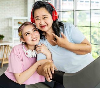 vecteezy_happy-asian-daughter-and-elderly-mother-in-sportswear_50037243-min