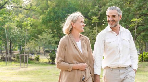 vecteezy_mature-couple-walking-in-a-park_2201705-min